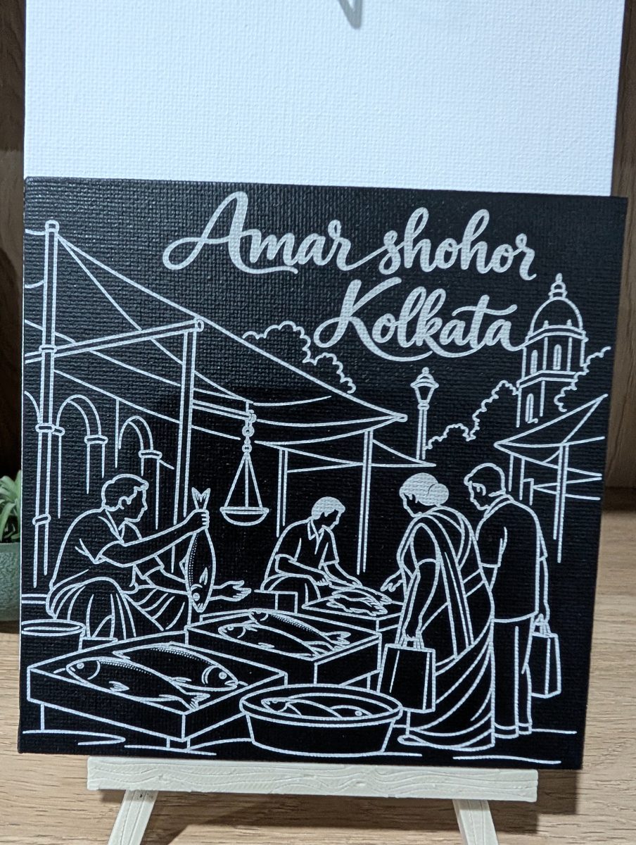 Amar Shohor Kolkata – Fish Market 5x5 inch laser-engraved canvas, displayed on a small easel