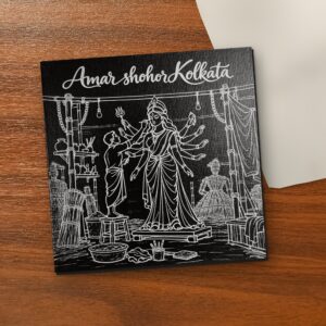 Amar Shohor Kolkata – Kumartuli 8x8 inch laser-engraved canvas on a wooden table