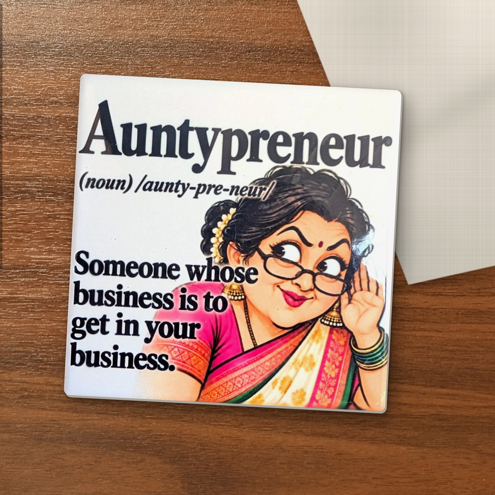 Auntypreneur coaster on a wooden table