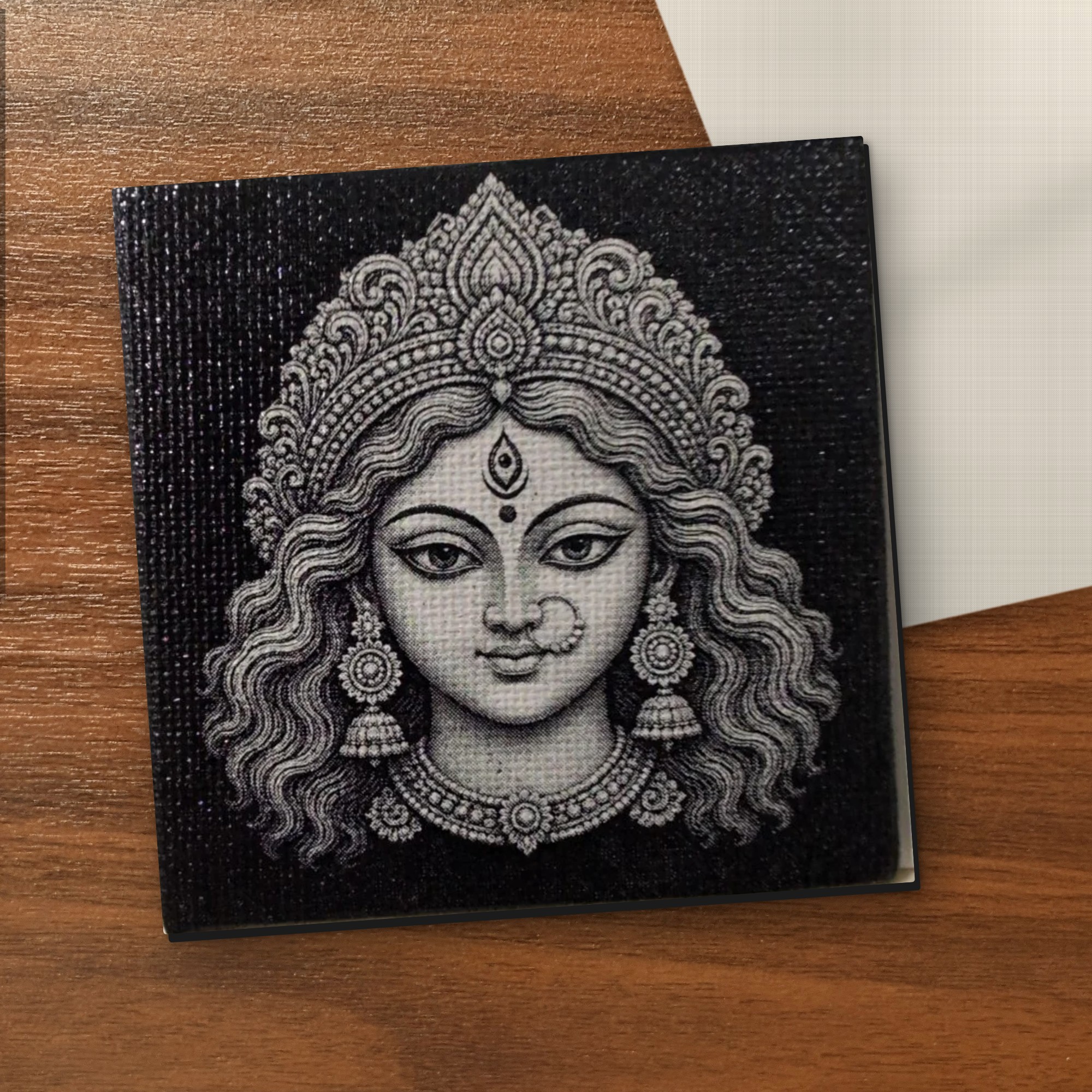 Durga Front Face canvas on a wooden table