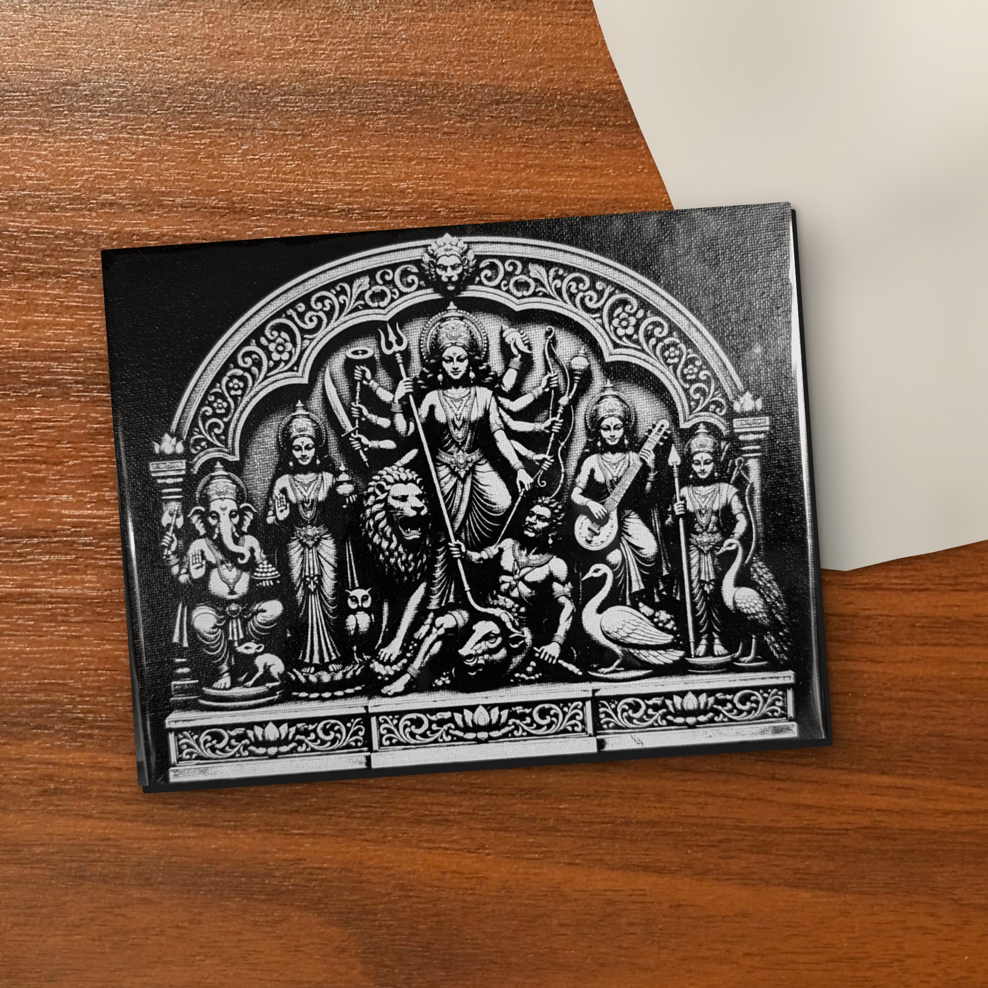 Ek Chala Durga black & white 7x9 inch laser-engraved canvas on a wooden table