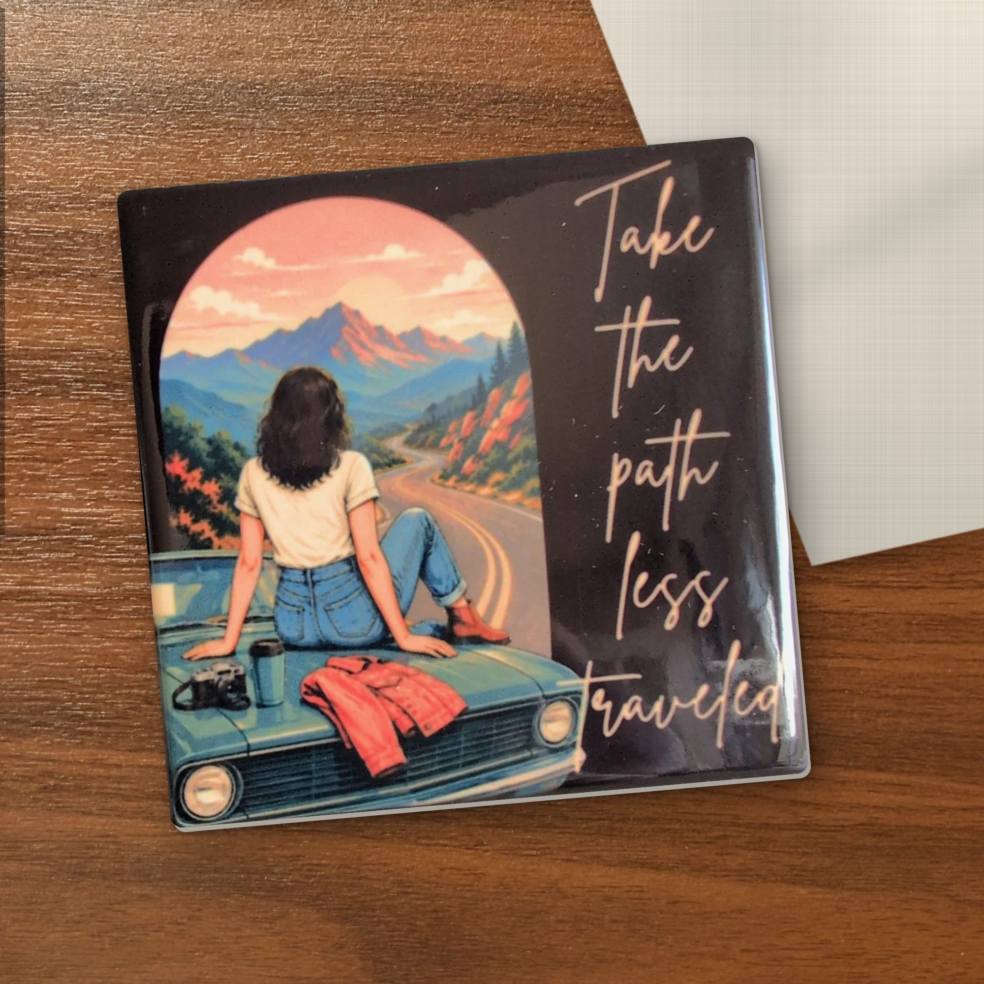 Take the Path Less Traveled coaster on a wooden table